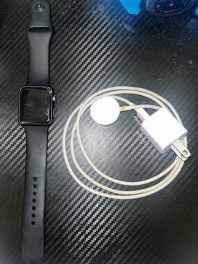 Apple Smartwatch 1 38mm with Black Silicone Band and White Charger